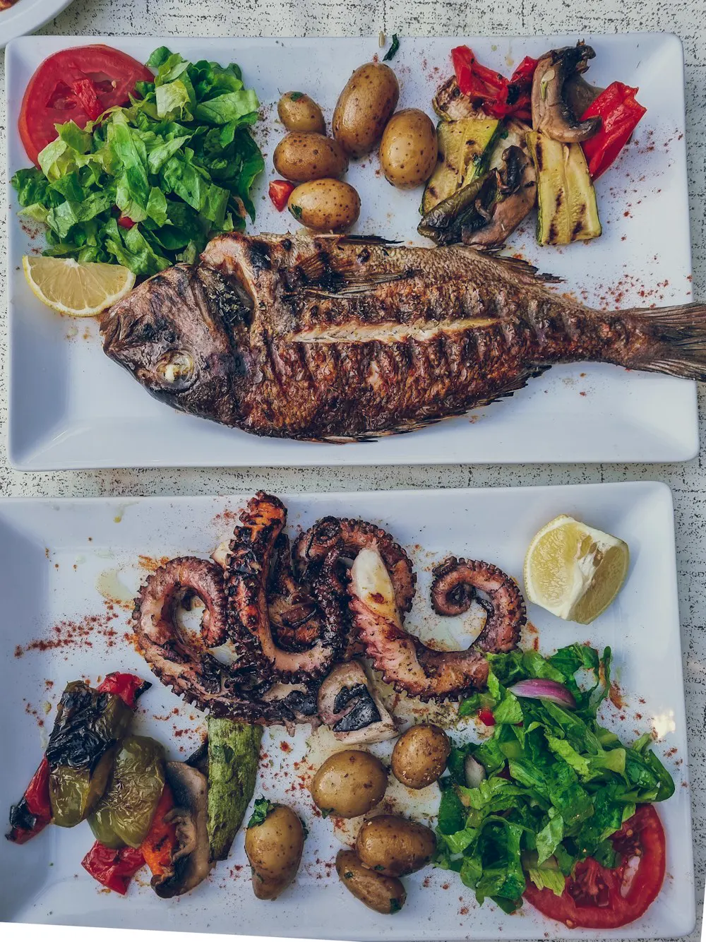 Pescado entero a la brasa y pulpo con limón